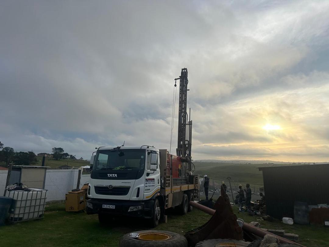 Everest Drilling truck at sunset